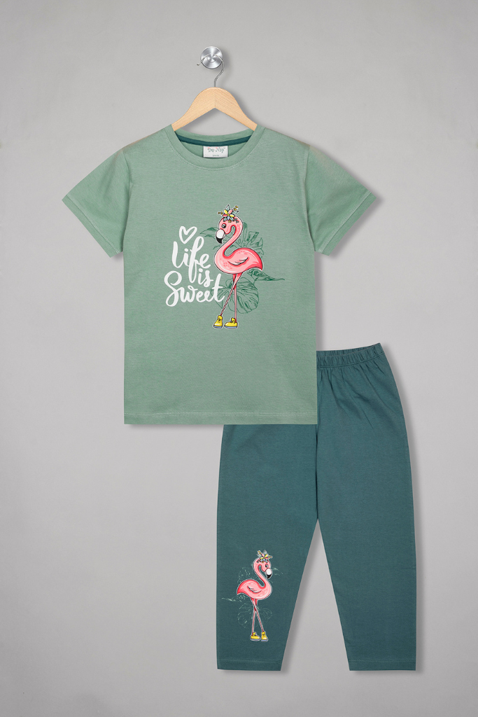 Enchanting green flamingo short sleeves pyjama set for girls, a delightful blend of comfort and chic style.